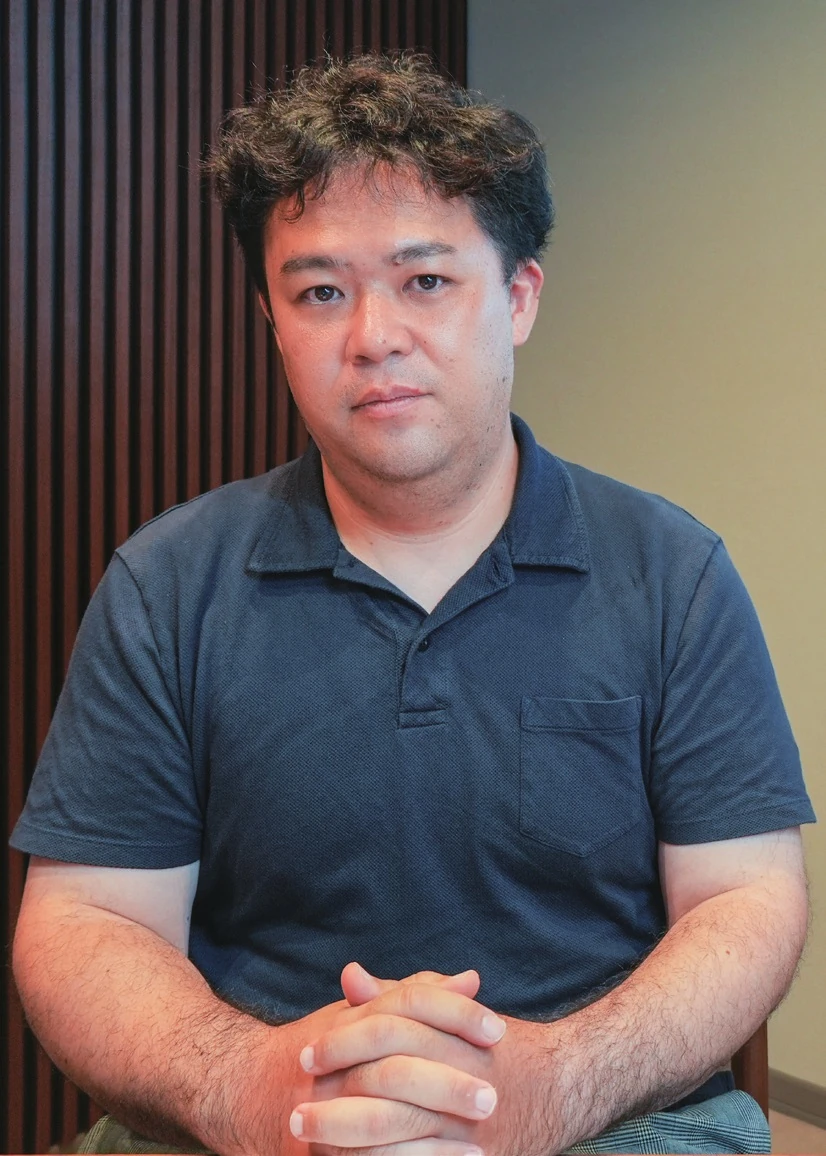 取材に答える西原亮氏